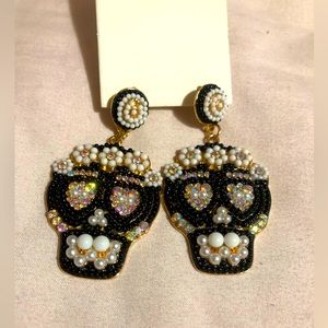 NWT Sugar skull earrings never worn.